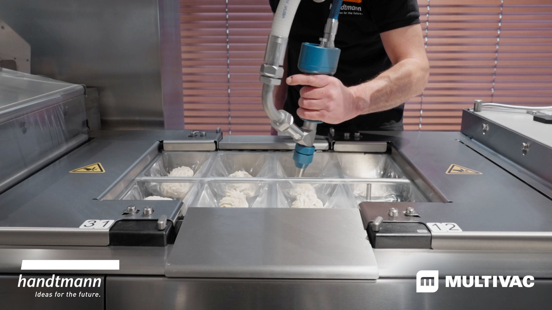 MULTIVAC Food Packaging Machine in Action MULTIVAC Food Packaging Machine in Action