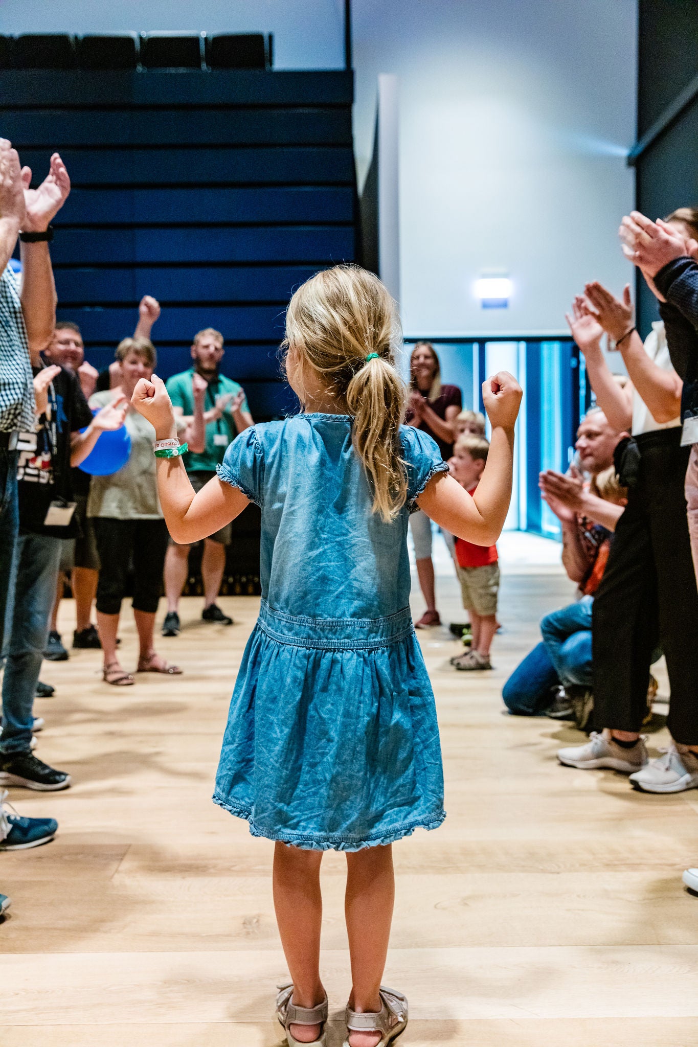 Child Celebrating in Community Gathering Child Celebrating in Community Gathering