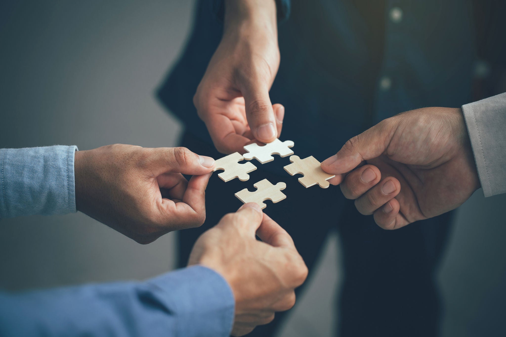 Collaborative Teamwork Puzzle Pieces Concept