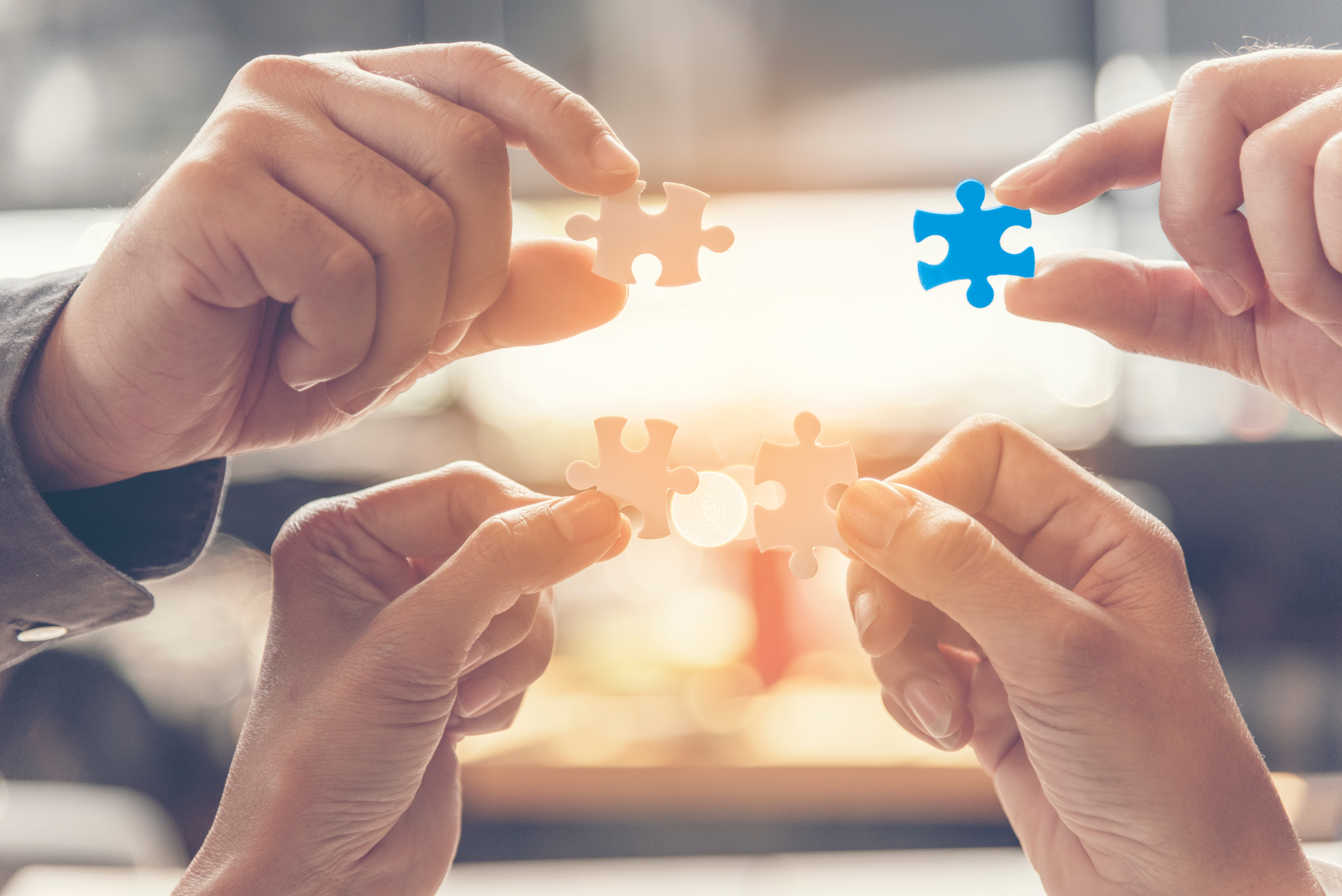 Team Collaboration Concept with Puzzle Pieces