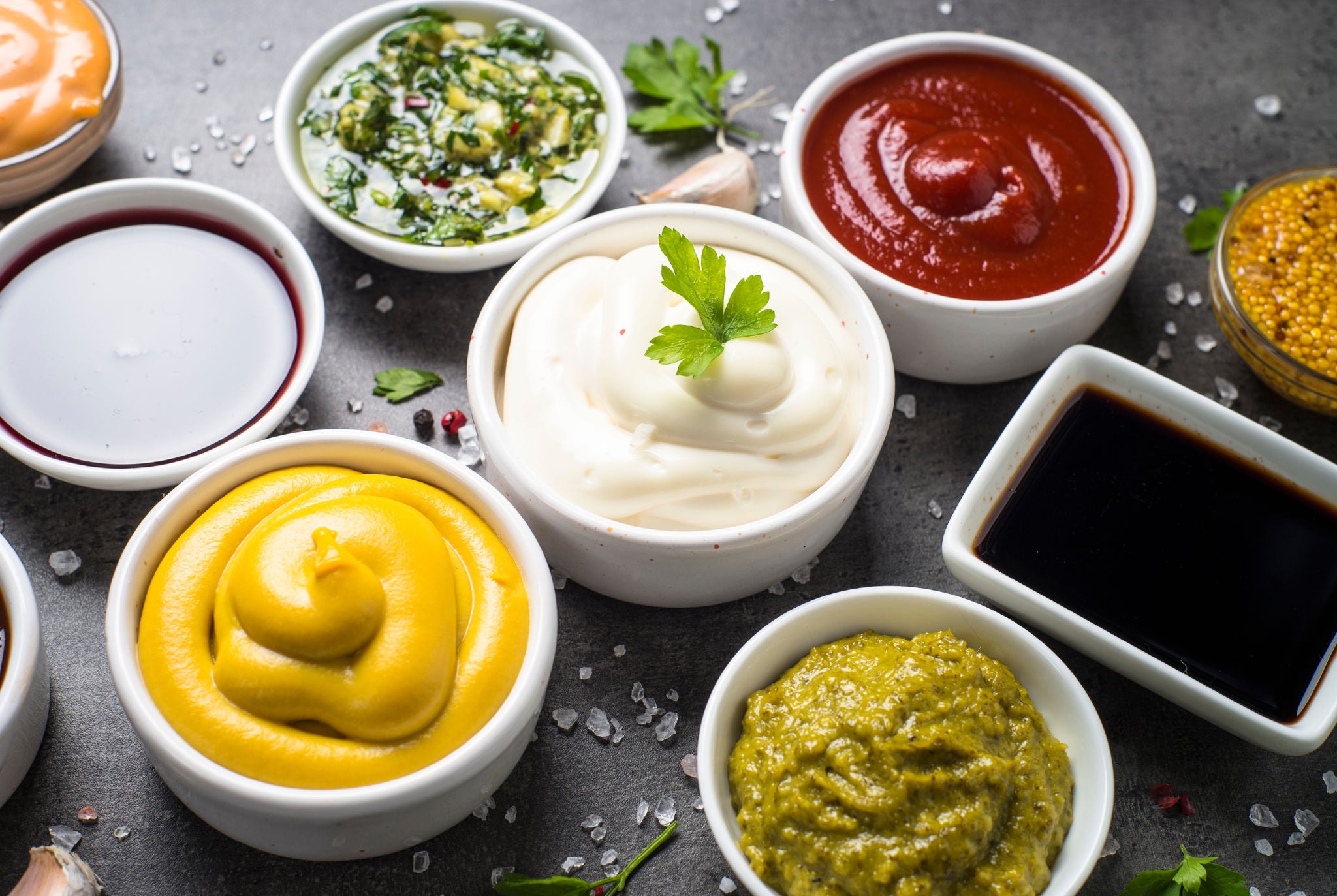 Assorted Sauces in Bowls with Fresh Ingredients