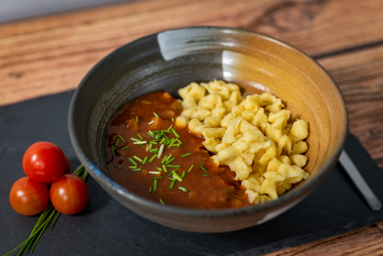 Delicious Beef Goulash with Spaetzle and Cherry Tomatoes Delicious Beef Goulash with Spaetzle and Cherry Tomatoes