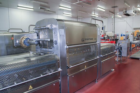 MULTIVAC Packaging Machine in Industrial Setting MULTIVAC Packaging Machine in Industrial Setting