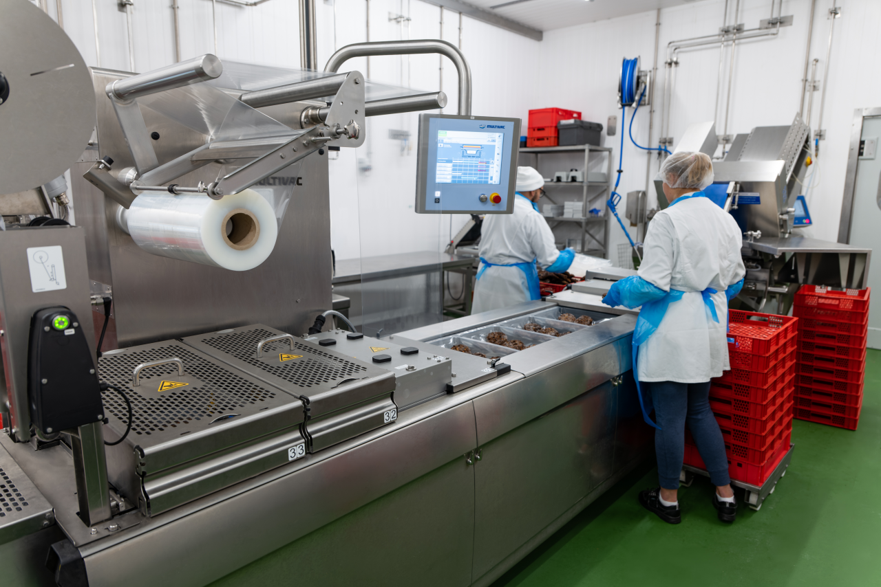 MULTIVAC Packaging Machine in Food Processing Facility MULTIVAC Packaging Machine in Food Processing Facility