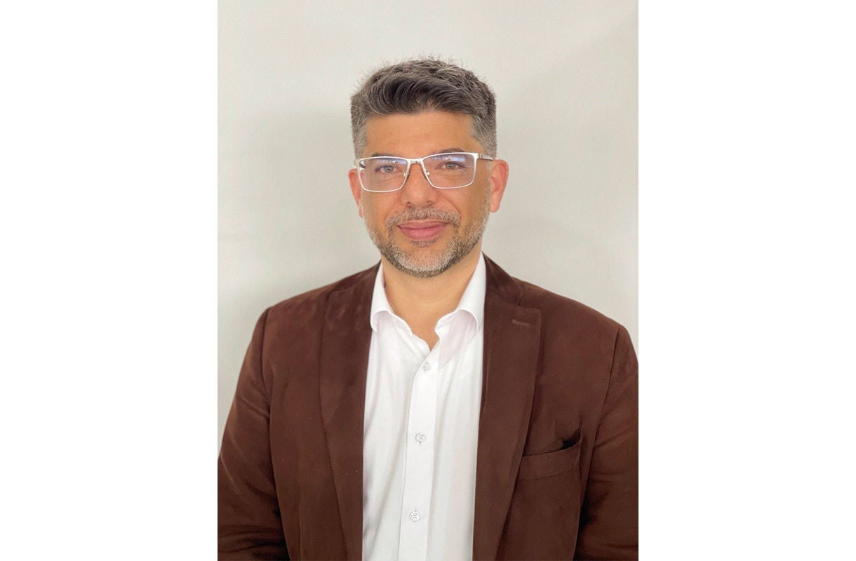 Business Professional in Brown Suit Business Professional in Brown Suit